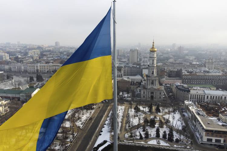 A Ukrainian national flag waves over the center of Kharkiv, Ukraine’s second-largest city, Feb. 16, 2022.