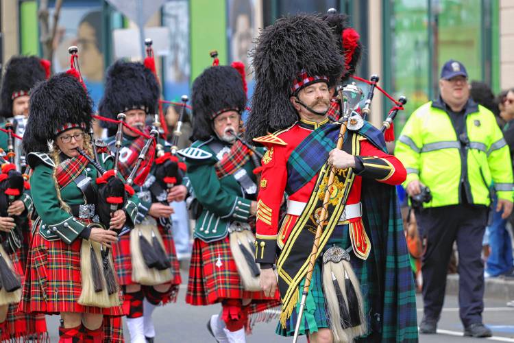  Members of the Holyoke Caledonian Pipe Band march in the 71st annual St. Patrick’s Day parade in Holyoke on Sunday.