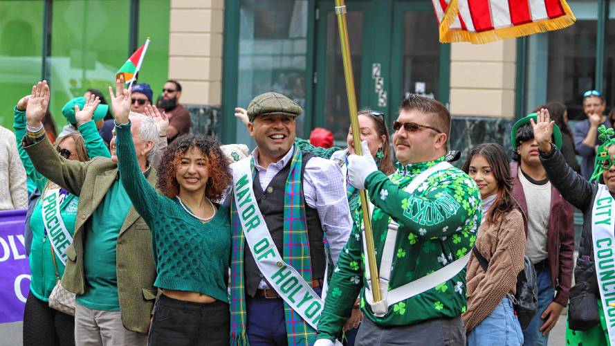  Holyoke Mayor Josh Garcia, pictured in the center, poses with family members during the 71st annual St. Patrick’s Day parade in Holyoke on Sunday.