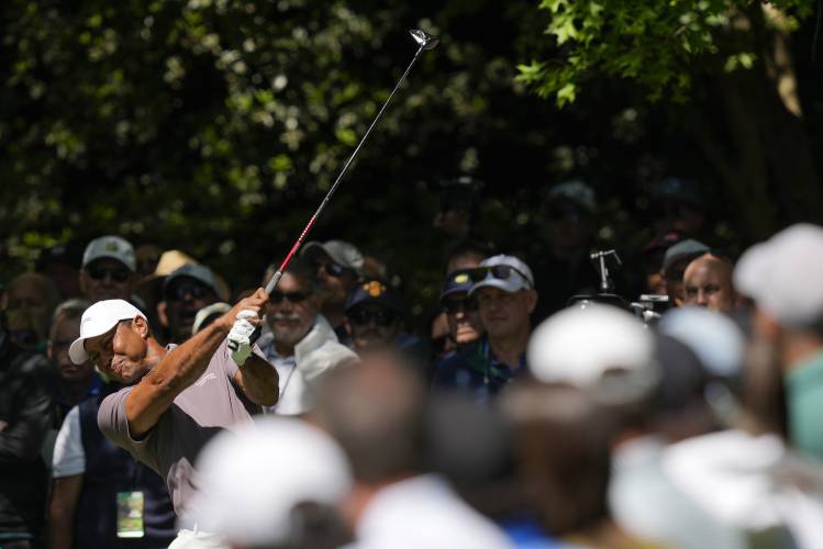 Tiger Woods hits his tee shot on the seventh hole during second round at the Masters golf tournament at Augusta National Golf Club Friday, April 12, 2024, in Augusta, Ga. (AP Photo/David J. Phillip)