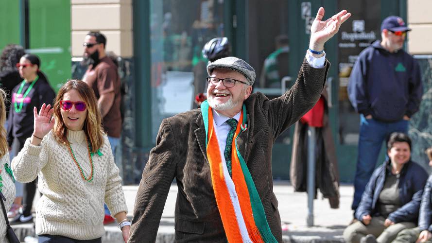  Hampshire County Sheriff Patrick Cahillane waves to the crowd during 71st annual St. Patrick’s Day parade in Holyoke on Sunday. Cahillane was born in Ireland before immigrating to the United States with his family when he was 10 years old.