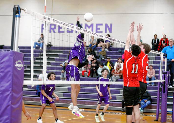 Holyoke’s Adrian Centeno-Feliciano (4) hits at the net in the second set against Athol on Friday in Holyoke.