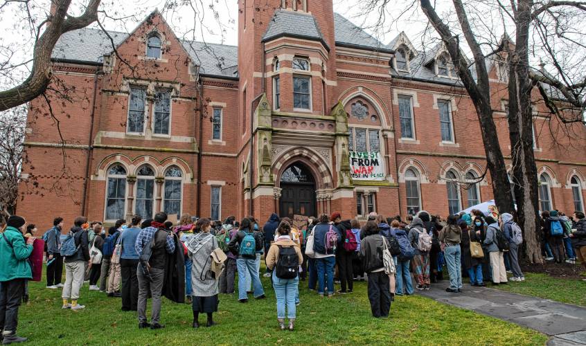 Smith College students rally outside College Hall on Thursday as part of a protest demanding divestment from weapons contractors supplying armaments for Israel’s Gaza offensive. Other students have occupied College Hall and plan to stay until their demands are met.
