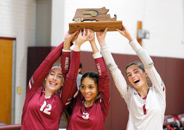 Amherst captains Emerson Joyce, from left, Talia Sadiq and Liza Beigel receive the MIAA Division 3 Final Four plaque after defeating Holliston on Thursday in Amherst.