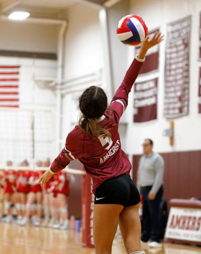 Amherst’s Talia Sadiq (5) serves an ace in the fourth set against Holliston during the MIAA Division 3 quarterfinal Thursday in Amherst.