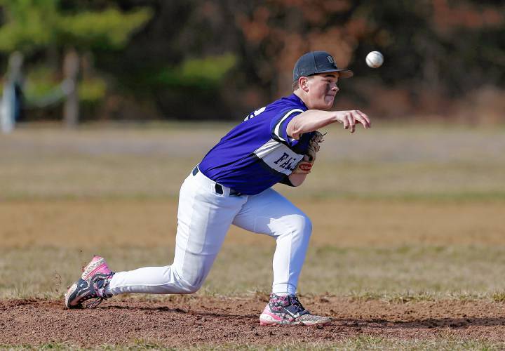 Smith Academy pitcher Harry LaFlamme (23) throws against Granby in the bottom of the first inning Friday in Granby.