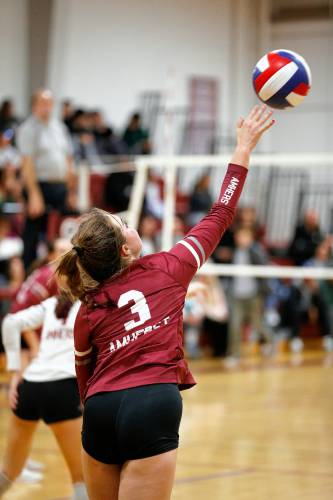 Amherst’s Annabel Ogden (3) serves in the fourth set against Holliston during the MIAA Division 3 quarterfinal Thursday in Amherst.