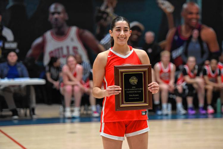 Northampton’s Ava Azzaro accepts the Basketball Hall of Fame Western Mass. Player of the Year Award at halftime of the Girls Senior All-Star Game on Thursday night in Springfield.