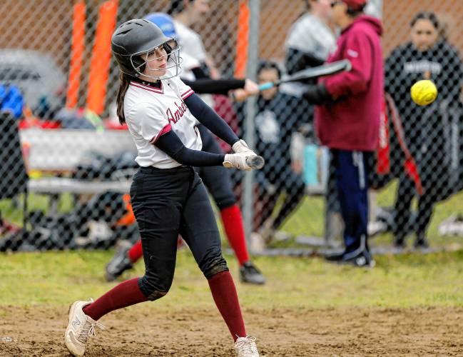 Amherst’s Nina Holden (10) drives in a run with a triple and scores after a wild throw from St. Mary’s in the bottom of the fourth inning Friday in Amherst.