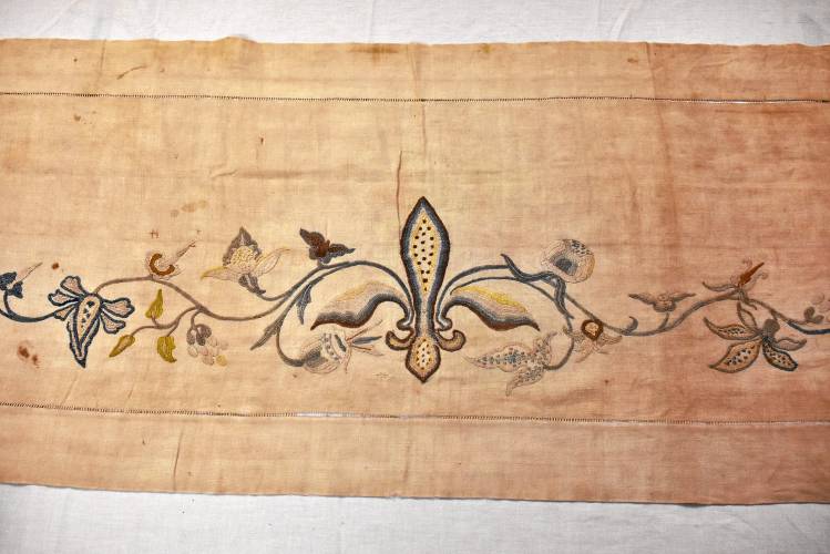 An 18th century Rebecca Dickinson-designed piano scarf. The needlework will be on displace at a Washington, D.C. museum throughout this year