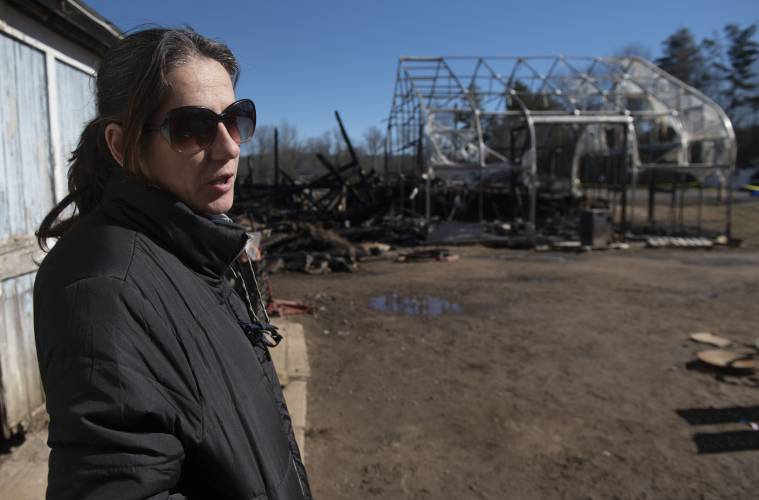 Stephanie Kennedy, the farm manager at Red Fire Farm in Granby, talks about the fire Monday morning that burnt a barn and green house Saturday afternoon.