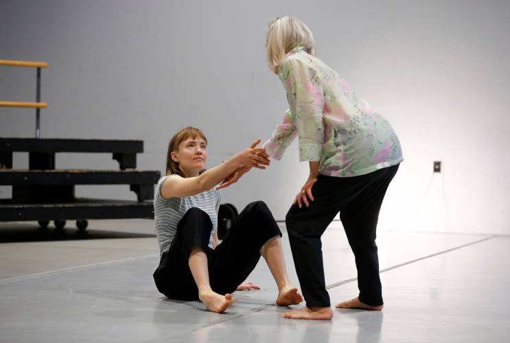 All the right moves: Maya LaLiberté, left, and Andrea Olsen rehearse in the Workroom Theater at 33 Hawley for their cross-generational dance at the Build-a-Floor Celebration Festival.