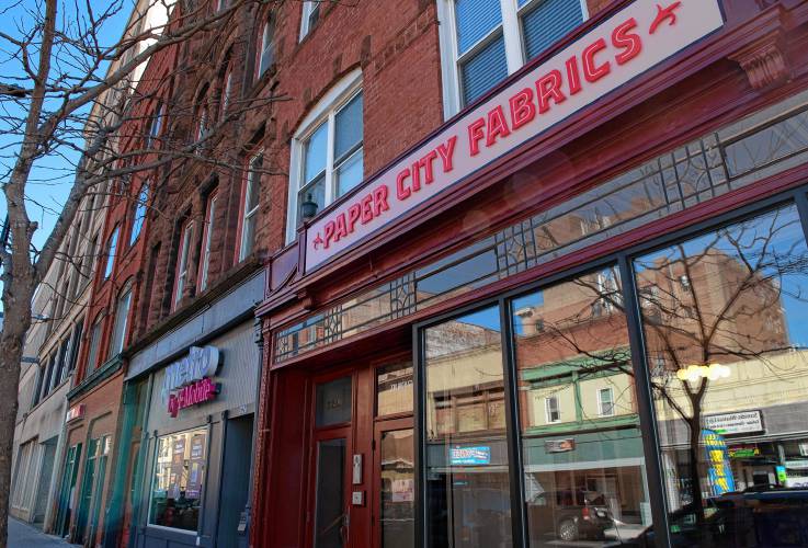  Paper City Fabrics on High Street in Holyoke, which is co-owned by Joseph Charles and Jeffrey Cattel.