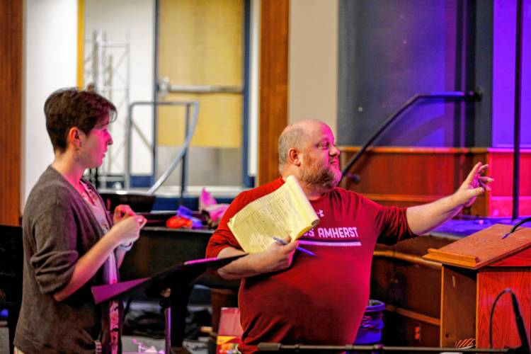 Musical director Susan Dillard, left, and director Dave Grout rehearse with the cast of Northampton High School’s production of 