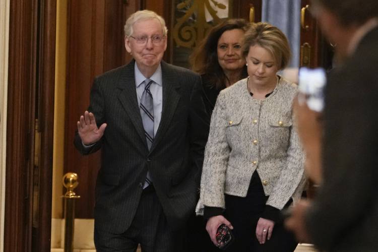 Senate Minority Leader Mitch McConnell of Ky., walks off the Senate floor after speaking, Wednesday, Feb. 28, 2024 at the Capitol in Washington. McConnell says he'll step down as Senate Republican leader in November. The 82-year-old Kentucky lawmaker is the longest-serving Senate leader in history. He's maintained his power in the face of dramatic changes in the Republican Party. He's set to make the announcement Wednesday McConnell on the Senate floor. (AP Photo/Jacquelyn Martin)