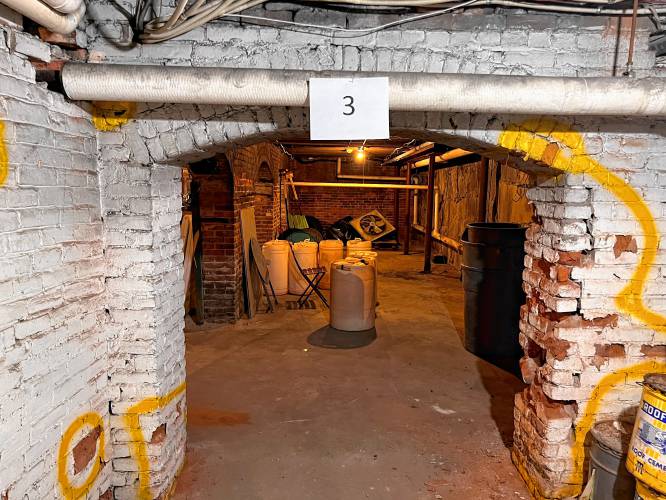 A brick arch in the basement of Memorial Hall is below the west park side building entrance that is closed for safety reasons. This is one of two basement arches that have shifted and need immediate historic restoration.