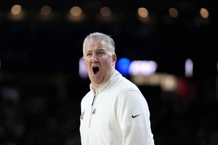 Purdue head coach Matt Painter yells during the first half of the NCAA college Final Four championship basketball game against UConn, Monday, April 8, 2024, in Glendale, Ariz. (AP Photo/Brynn Anderson)