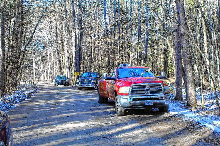 Investigators returned to Oak Hill Road Monday to collect debris and continue investigating a plane crash that killed all three on board Sunday morning.