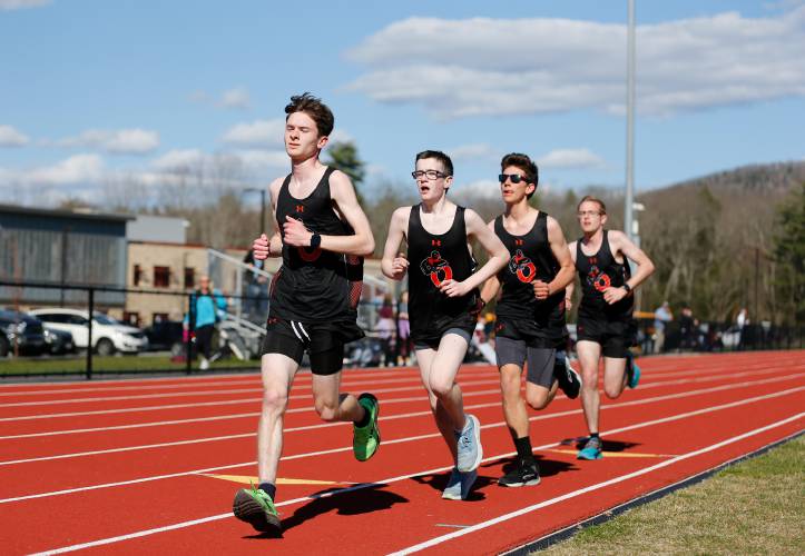Belchertown runners Tyler Benedetti, from left, Zach Mullen, Gavin Messier and Parker Crol compete in the 2-mile Tuesday during their meet against Easthampton at Mountain View School in Easthampton.