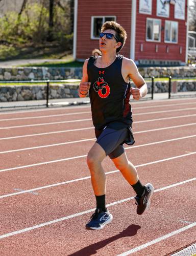 Belchertown’s Gavin Messier runs to a first place finish in the 2-mile Tuesday during their meet against Easthampton at Mountain View School in Easthampton.
