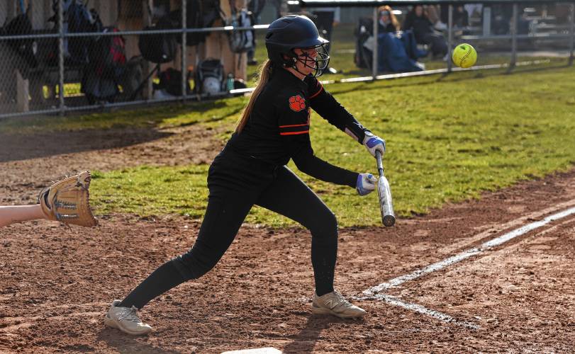 South Hadley’s Sophia Butler lays down a bunt against Easthampton during the visiting Tigers’ 1-0 victory on Monday at Nonotuck Park in Easthampton.