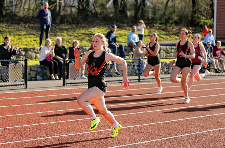 Belchertown’s Fallon Clancy runs to a first place finish in the girls 100 meter dash Tuesday during their meet against Easthampton at Mountain View School in Easthampton.