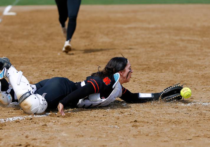 South Hadley catcher Ara Powers (15) dives for a shallow popup against Frontier in the top of the second inning Friday in South Hadley.
