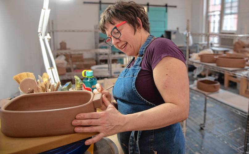 Tiffany Hilton works in her Florence studio, where she also teaches courses. She’s one of eight regional pottery hosts, and 21 visiting artists, who will be part of the Asparagus Valley Pottery Trail April 27-28.