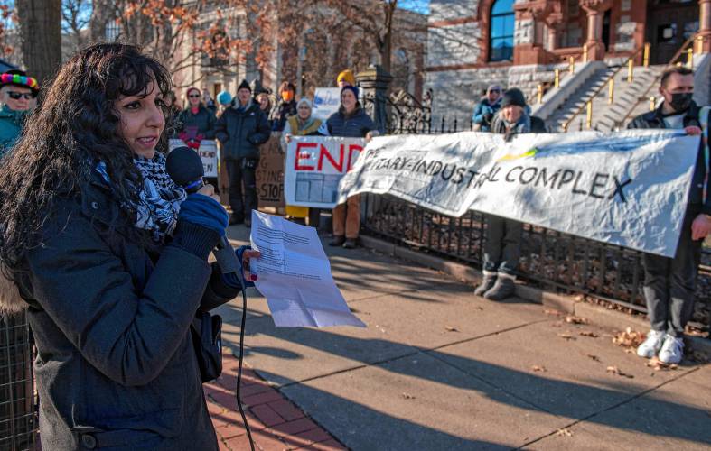 Zehra Parvez, one of the six arrested protesting L3Harris in October, speaks at a rally held in their support after leaving the Hampshire County courthouse on Thursday.