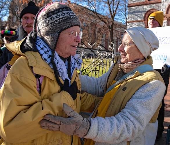  Paki Wieland, one of the six arrested for protesting L3Harris, gets a hug from sister Clare Carter after leaving the Hampshire County Superior courthouse in Northampton following her pretrial hearing on Thursday. The six arrested individuals were later greeted by a rally held in their support.