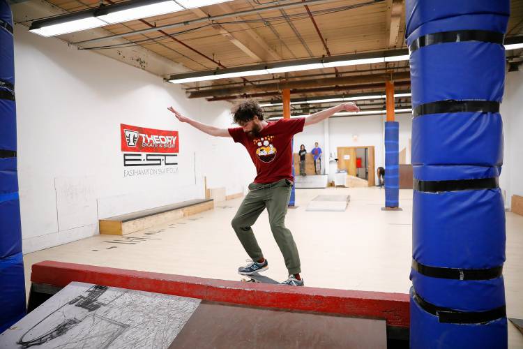 Ben Carton of Leeds takes his turn on a ramp at the Easthampton Skate Club at Eastworks.