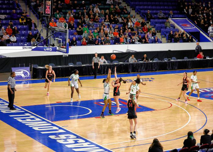 South Hadley’s CC Gurek (11) puts up a shot against Cathedral in the second quarter of the MIAA Div. 4 girls basketball state final Sunday afternoon at the Tsongas Center in Lowell.