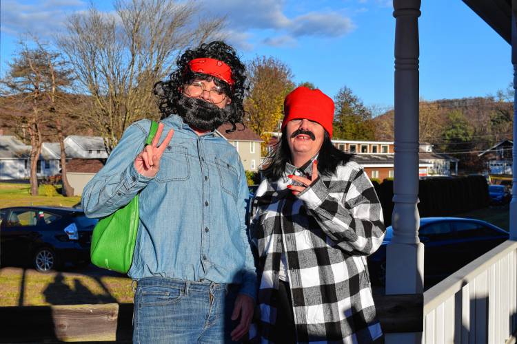 Lisa O’Brien and Jessi Lemos, of Quincy, dressed up as Cheech Marin and Tommy Chong to meet the comedy duo at the grand opening of Cheech & Chong’s Dispensoria in Whately on Saturday.