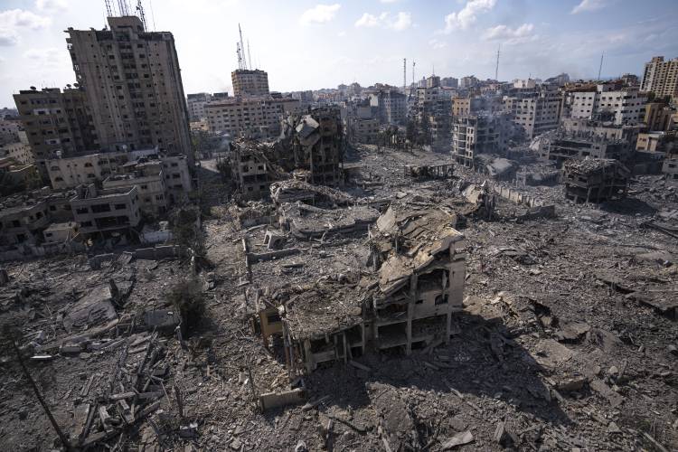 A view of the rubble of buildings hit by an Israeli airstrike, in Gaza City, on Oct. 10, 2023. After 11 weeks of war in Gaza, the Israeli military campaign against Hamas now sits among the deadliest and most destructive in history.