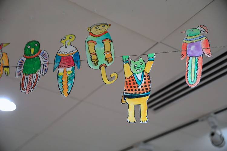 For “Kid in a Candy Store,” children’s book artist Seymour Chwast cut and hand-painted these playful figures, which were then attached to overhead wires.