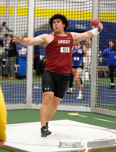 Amherst’s Logan Alfandari competes in the shot put with first place throw of 51-10.75 during the PVIAC indoor track meet Wednesday at Smith College in Northampton.