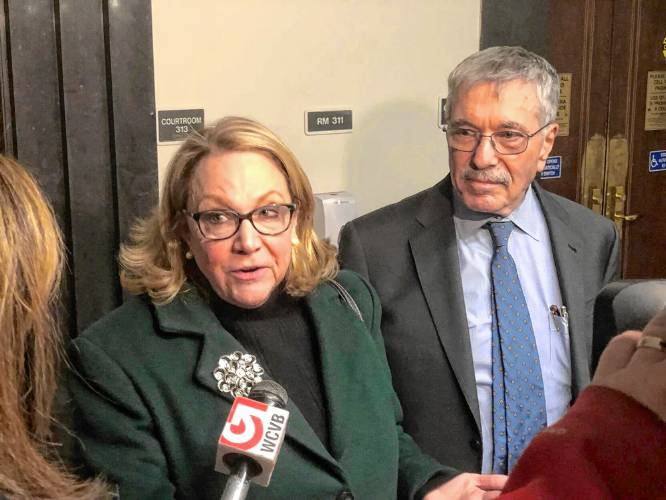 Suspended Cannabis Control Commission Chairwoman Shannon O’Brien and her lawyer, Max Stern, spoke with reporters after a Dec. 14, 2023 hearing in Suffolk Superior Court.