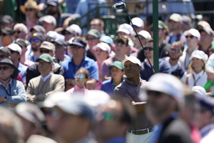 Tiger Woods watches his tee shot on the eighth hole during second round at the Masters golf tournament at Augusta National Golf Club Friday, April 12, 2024, in Augusta, Ga. (AP Photo/David J. Phillip)