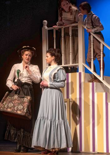 Aoife Reynolds as Mary Poppins and Bridget Sullivan as Winifred Banks rehearse for Hampshire Regional High School’s production of “Mary Poppins” this weekend. The show runs Friday and Saturday at 7 p.m. and Sunday at 2 p.m. 