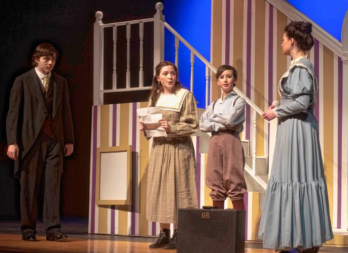  Matt Cesare as George Banks, Lucy McVey as Jane Banks, Izzy Torres-Mor as Michael Banks, and Bridget Sullivan as Winifred Banks rehearse for Hampshire Regional High School’s production of “Mary Poppins” this weekend. The show runs Friday and Saturday at 7 p.m. and Sunday at 2 p.m.   