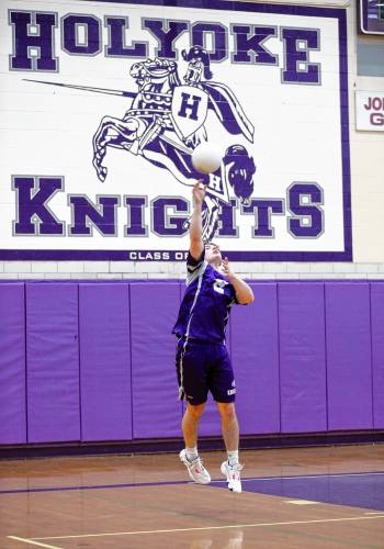 Holyoke’s Alexx Dumas (2) serves the ball in the first set against Athol on Friday in Holyoke.