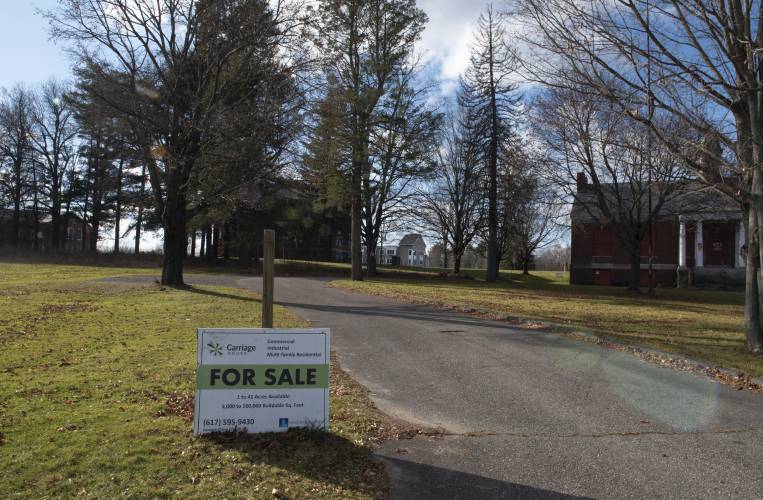 The Belchertown Planning Board has approved a site plan for a 100-unit housing development at Carriage Grove, the former   Belchertown State Hospital grounds.