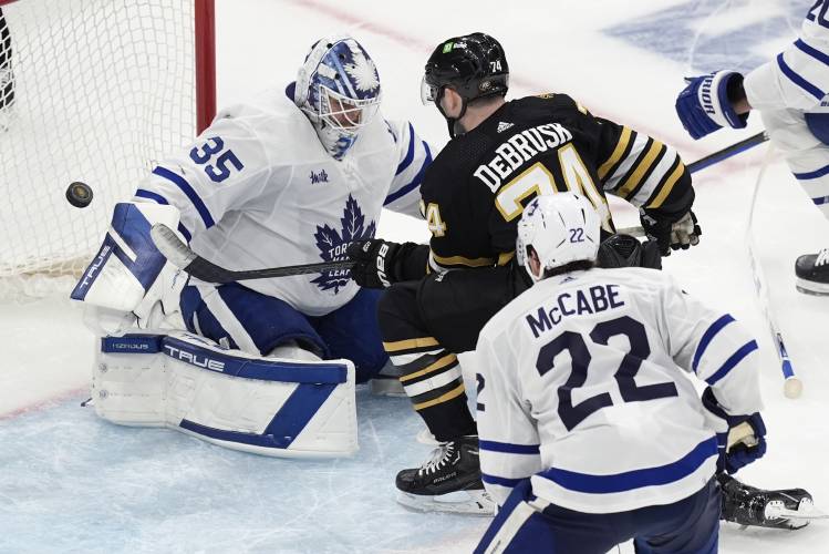 Boston Bruins' Jake DeBrusk (74) scores against Toronto Maple Leafs' Ilya Samsonov (35) during the second period in Game 1 of an NHL hockey Stanley Cup first-round playoff series Saturday, April 20, 2024, in Boston. (AP Photo/Michael Dwyer)