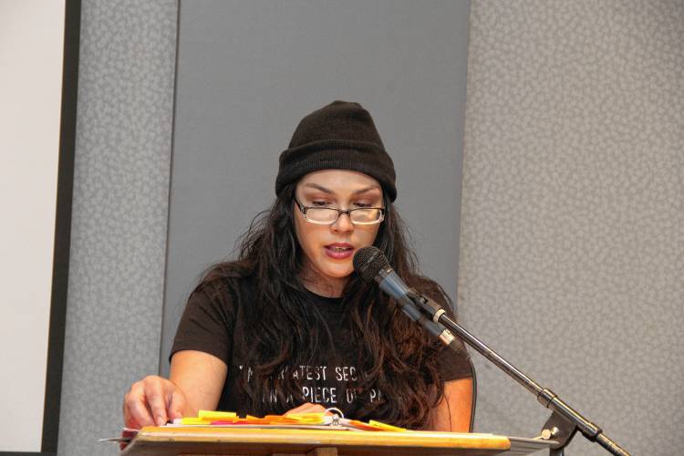 Sonia Mendez, of Williamsburg, is a graduate of Holyoke Community College and a veteran member of the Voices from Inside writing group, reads her poetry during an appearance at the college. 