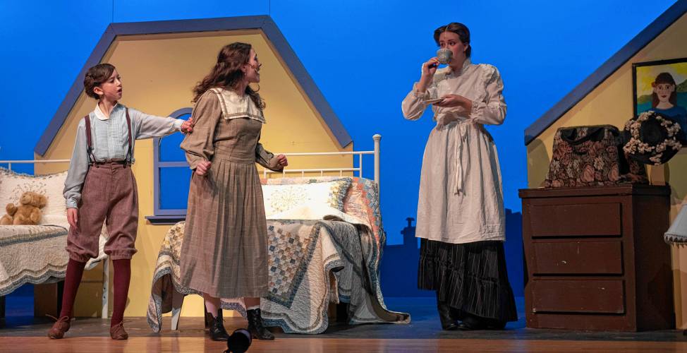 Izzy Torres-Mor as Michael Banks, Lucy McVey as Jane Banks, and Aoife Reynolds as Mary Poppins rehearse for Hampshire Regional High School’s production of “Mary Poppins” this weekend. The show runs Friday and Saturday at 7 p.m. and Sunday at 2 p.m. 