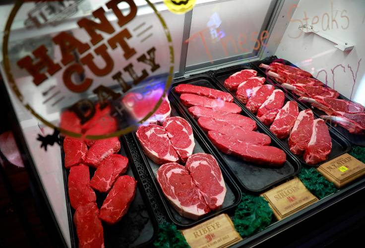 USDA Choice hand-cut steaks at the “pick your own” counter at Texas Roadhouse.