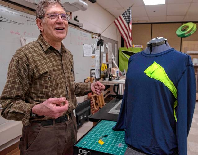 John Fabel, the adviser for the InvenTeam at Amherst Regional High School, with a prototype of the garment, talks about the project the students have invented this year. It’s called SARAH, Search And Rescue Assistant Hardware, and it will transmit the vital signs of search and rescue personnel while they are on a mission.