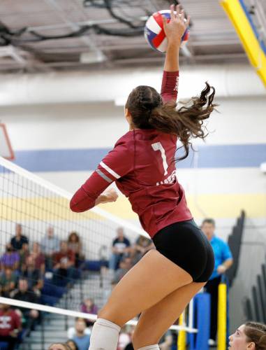 Amherst’s Sophie Kawall (7) gets a kill against Longmeadow in the fourth set of the Western Massachusetts Class A girls volleyball final Saturday at Chicopee Comp.