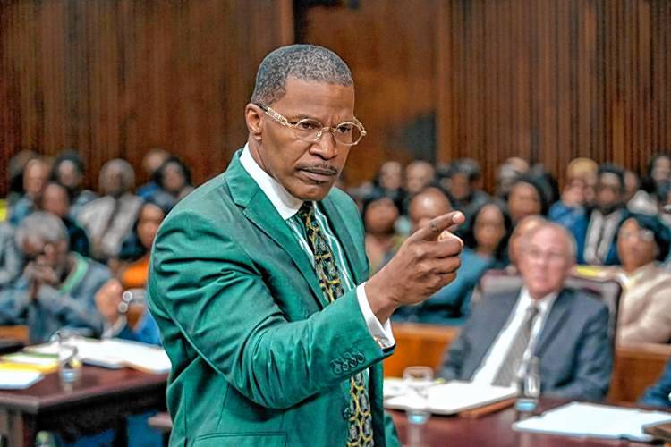 Jamie Foxx plays attorney Willie Gary in a scene from “The Burial.”