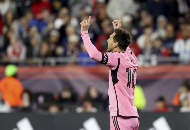 Inter Miami forward Lionel Messi reacts after scoring in the first half of an MLS match against the New England Revolution, Saturday in Foxborough.